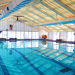 Piscina Four Seasons Pool, Splash Pad, and Fitness Center - Marshall County